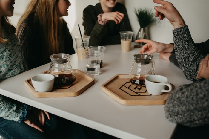 Friends meeting for coffee