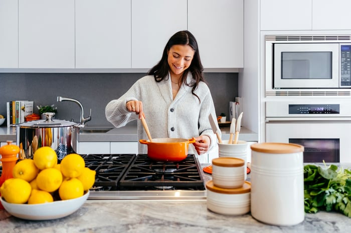 A woman cooking in the kitchen